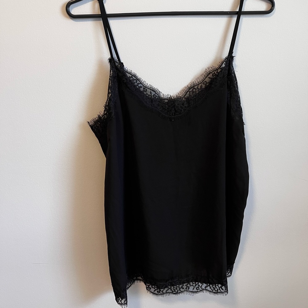 Flowy tank top with lace detailing and adjustable straps